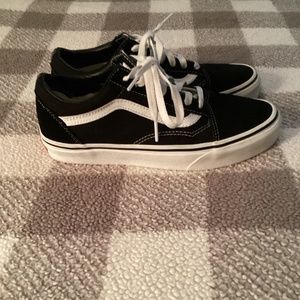 Vans black and white laced shoes size 7 in women’s